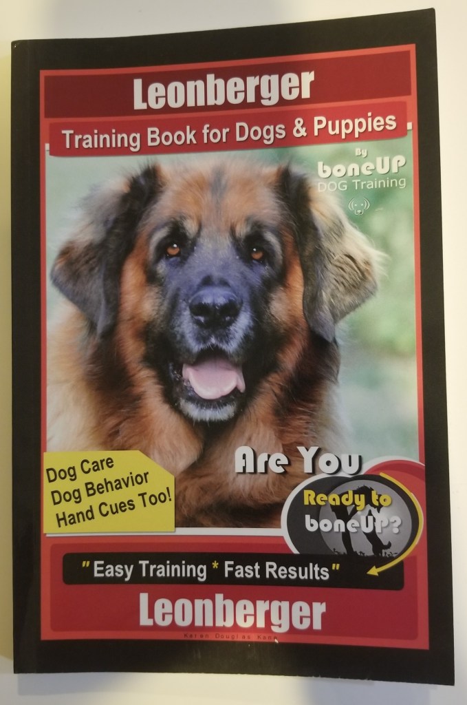Photo of the front cover of the book. Leonberger Training Book for Dogs & Puppies By BoneUP DOG Training, Dog Care, Dog Behavior, Hand Cues Too! Are You Ready to Bone Up? Easy Training * Fast Results, Leonberger. By Karen Douglas Kane two stars. Two stars.
