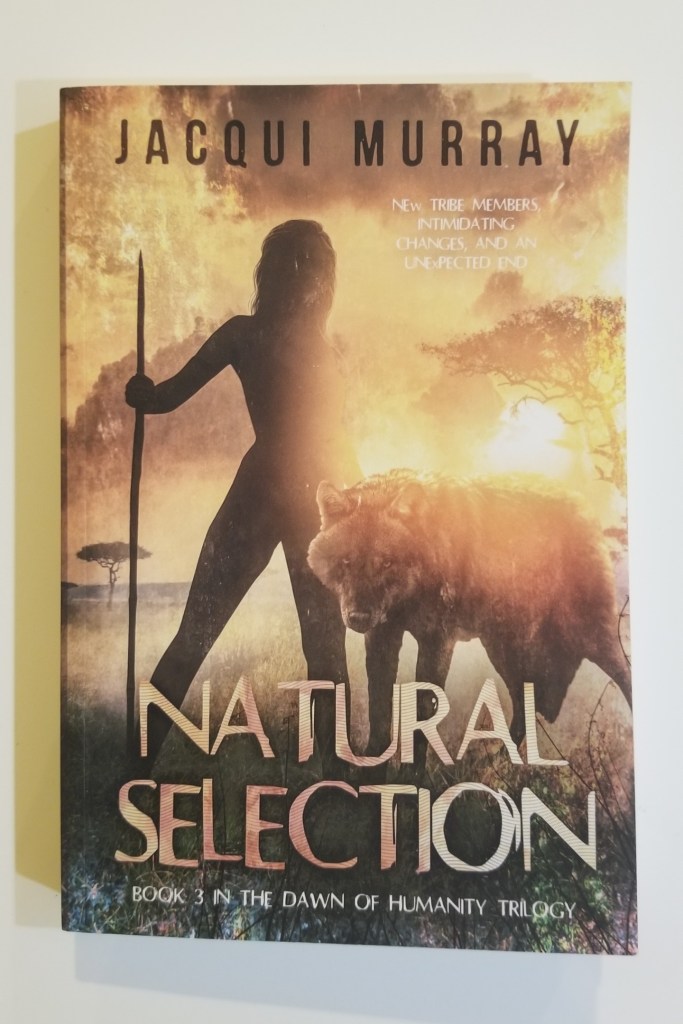 Photo of the Front cover of the book Natural Selection, book 3 in the dawn of humanity trilogy by Jacqui Murray. Click on the image to go to the Amazon location for Natural Selection.