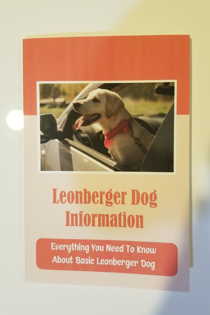 Front cover of the book Leonberger Dog Information by Bao Reives. It is a photo of a white Labrador looking out the window of a car. Click on the image to go to the Amazon location for the book.