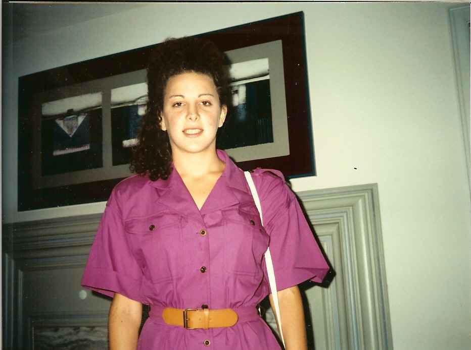 Claudia in a purple dress