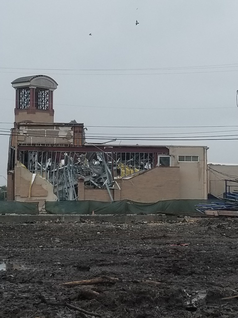 A photo of the Gap store nearby where we live. One of the walls is gone.