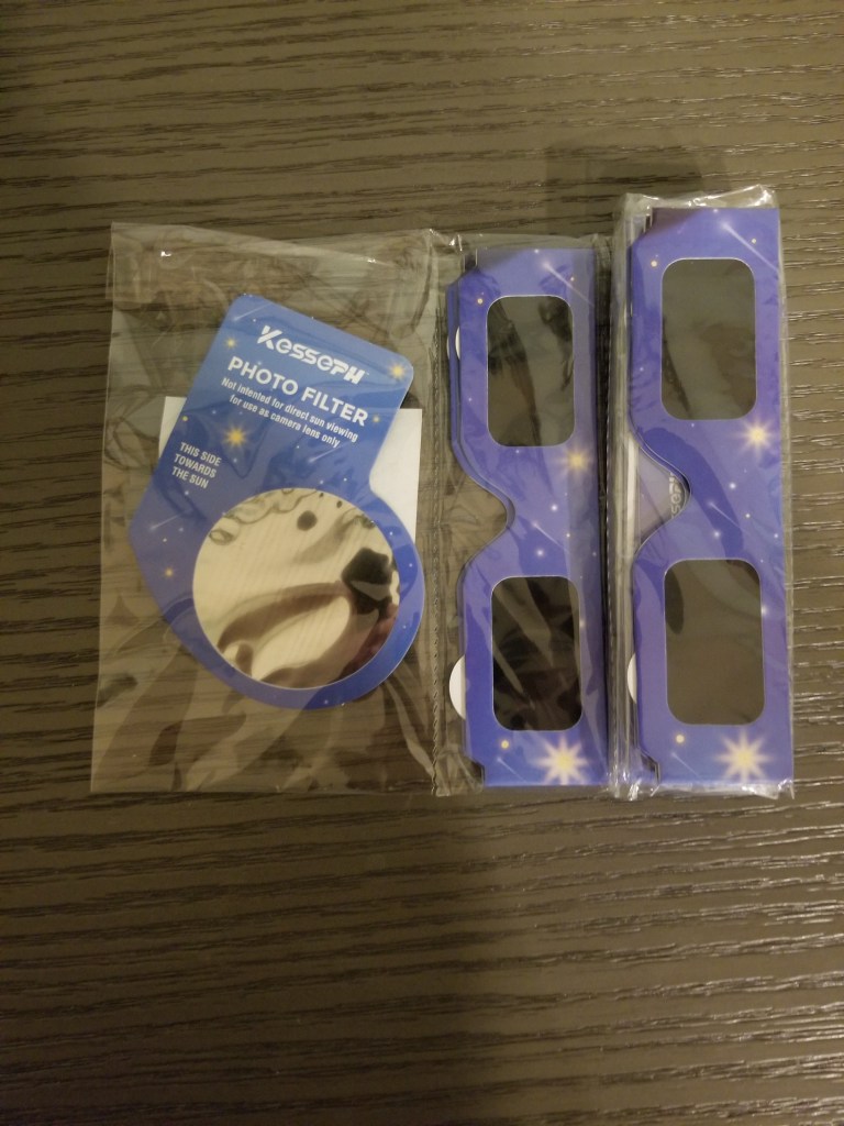 Photo of my 10 solar eclipse glasses.