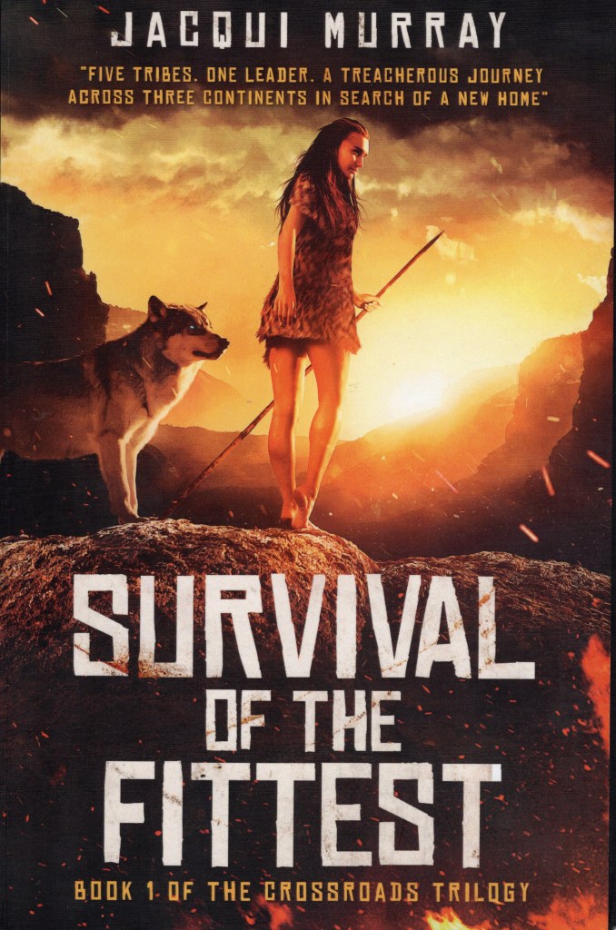 The front cover feature title and author name and a picture of a wolf and a tall prehistoric girl holding a spear.