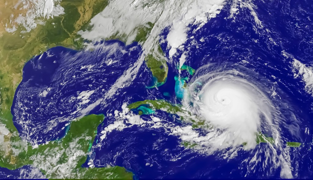 Satellite photo of Mexico, southeastern United States and the Caribbean. A hurricane is approaching from the east.