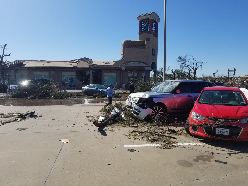 Crashed cars and destroyed stores.
