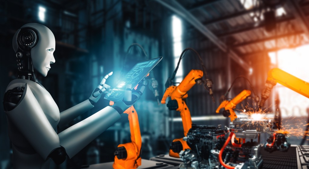 Humanoid robots and several orange industrial robots. MLP Mechanized industry robot and robotic arms for assembly in factory production. Concept of artificial intelligence for industrial revolution and automation manufacturing process.