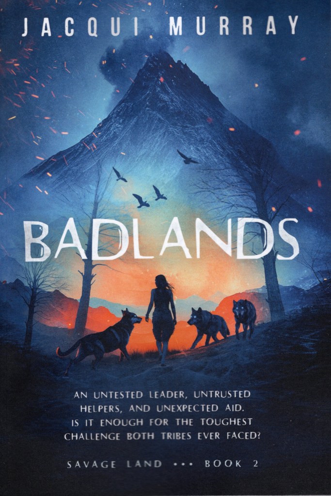 The front cover features a volcano and a woman surrounded by wolves.