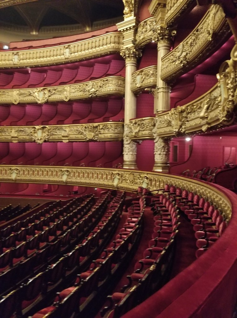 The back of the auditorium of Palais Opéra Garnier. There are five levels.