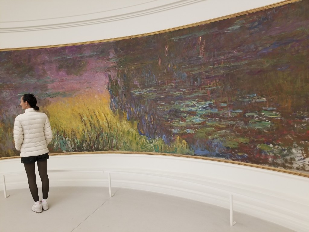 The photo shows a painting which covers an entire wall.