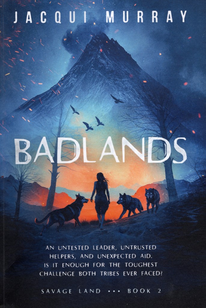 The front cover features the title and author, a neanderthal woman and three canines (wolves). There is an erupting volcano in the background.