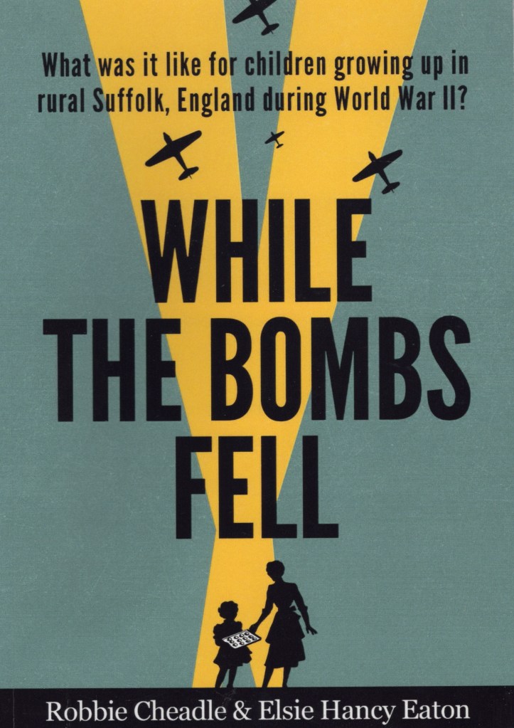 The front cover features planes in the air dropping bombs as search lights are searching for the planes. There are a mother and a girl standing at the bottom down of the page representing the ground.