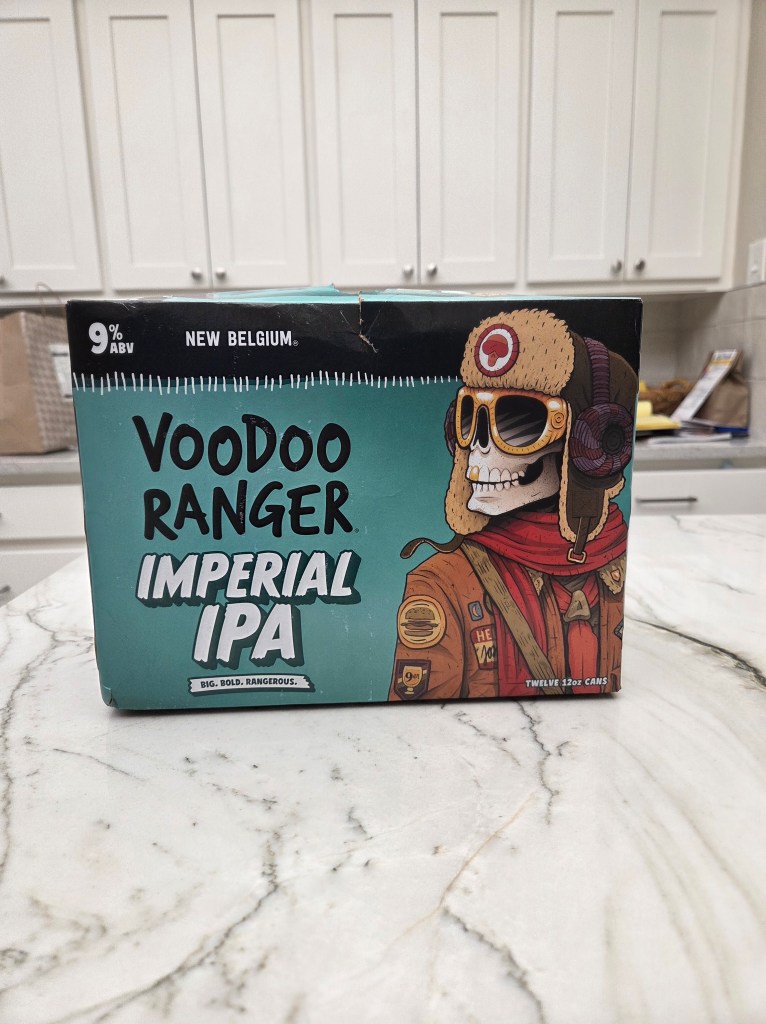 A 12 pack of Voodoo Rangers Imperial IPA standing on marble kitchen counter.